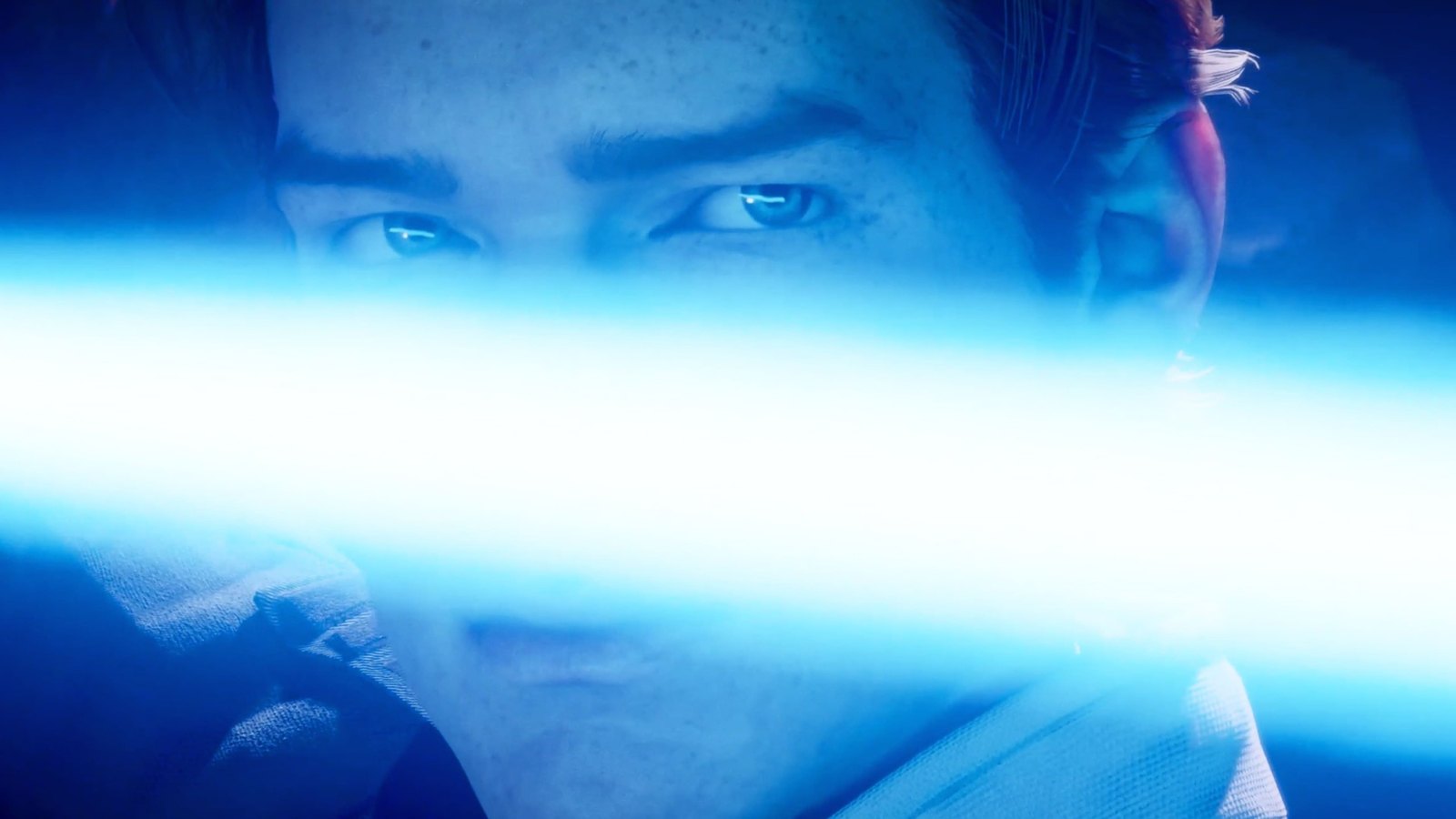 A screenshot of Cal Kestis's face, holding his lightsaber out in front. The lightsaber stretches across the frame, blocking parts of his face.